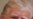 FILE - Former President Donald Trump listens as he speaks with reporters while in flight on his plane after a campaign rally at Waco Regional Airport, in Waco, Texas, March 25, 2023.