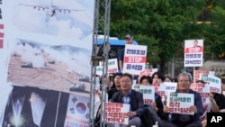 Protesters stage a rally demanding the end of military exercises and propaganda amid rising tensions between North and South Korea, in Seoul, South Korea, June 24, 2024. North Korea resumed launching balloons toward South Korea on Monday night.