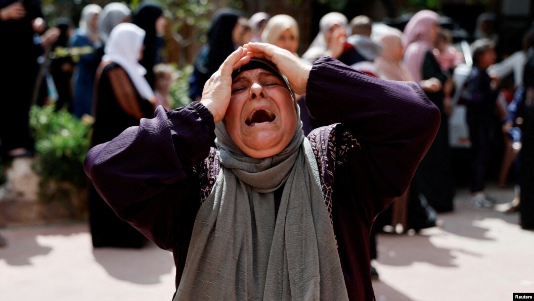Tư liệu- Một người phụ nữ khóc than tại đám tang của 4 người Palestine thiệt mạng trong cuộc đụng độ với những người định cư Israel, gần Nablus ở Bờ Tây do Israel chiếm đóng, ngày 12 tháng 10 năm 2023.
