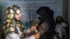 FILE - Seorang perempuan Afghanistan diperiksa oleh ahli gizi di sebuah klinik yang dikelola oleh WFP, di Kabul, Afghanistan, Kamis, 26 Januari 2023. (AP/Ebrahim Noroozi)