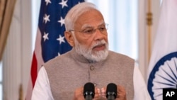 FILE - India's Prime Minister Narendra Modi speaks during a visit to Washington, June 23, 2023. The reported recent violence against women "can never be forgiven," he said on July 20.