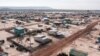 This handout picture taken on July 6, 2023 and released on November 13 by Amnesty International shows an aerial view of the Run Ta Ek relocation site near Siem Reap. (AFP/AMNESTY INTERNATIONAL)