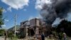 Ukrainian State Emergency Service firefighters put out a fire at a house destroyed in a Russian shelling, in a residential neighborhood, in Kherson, Ukraine, July 1, 2023.
