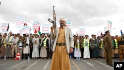 FILE - Houthi supporters attend a rally against the US-led airstrikes on Yemen and in support of the Palestinians in the Gaza Strip, in Sanaa, Yemen, Feb. 9, 2024.