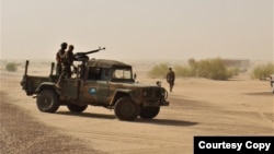 FILE: Mali Army personnel man a checkpoint at Roda Junctiom on the Tombouctou -Goundam road. Taken March 27, 2023.