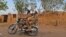 Sudanese army soldiers ride a motorcycle in Khartoum, on June 26, 2023. 