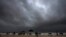 Rain clouds fill the sky at a mostly deserted beach ahead of Cyclone Biparjoy's landfall at Mandvi in Kutch district of Gujarat state, India, June 15, 2023. 