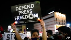 FILE - Activists condemn the killing of a Filipino journalist in Quezon city, Philippines, on Oct. 4, 2022. The Philippines is widely regarded as among the most dangerous places in the world for journalists.
