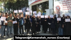 In an image posted on Telegram by a group called "Kermanshah nurses and medical staff" on Aug. 27, 2024, Iranian nurses and medical workers gather at Kermanshah University of Medical Sciences in Iran as part of a strike over poor working conditions. (Telegram/@Kermanshah_nurses)