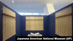 FILE - The Ireichō, a book which lists the names of the more than 125,000 people who were detained in internment camps for Japanese Americans nationwide during World War II, is seen at the museum in Los Angeles, Sept. 24, 2022. 