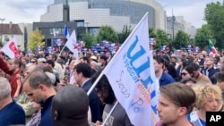 People gather against antisemitism, June 20, 2024, in Paris.