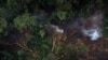 资料照片：2019年9月30日，空中拍摄到的刚果民主共和国东北地区的森林砍伐。（法新社照片）