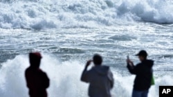 Heavy surf pounds the coastline at Nauset Beach in East Orleans, Massachusetts, on the incoming tide on Sept. 15, 2023.