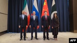 Iran's FM Hossein Amir-Abdollahian, Russian FM Sergei Lavrov, China's FM Qin Gang and Pakistan's minister of State for Foreign Affairs Hina Rabbani Khar during their meeting in Samarkand, Apr. 13, 2023. (Handout/Russian Foreign Ministry/AFP) 