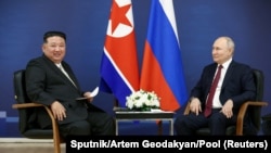 FILE - Russian President Vladimir Putin and North Korean leader Kim Jong Un meet at the Vostochny Сosmodrome in the far eastern Amur region, Russia, Sept. 13, 2023. (Sputnik/Artem Geodakyan via Reuters)