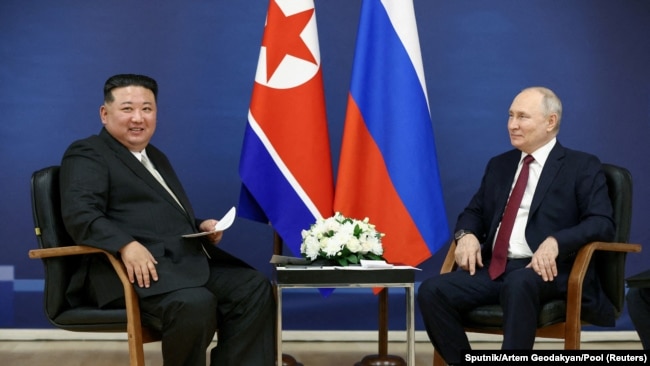 FILE - Russian President Vladimir Putin and North Korean leader Kim Jong Un meet at the Vostochny Сosmodrome in the far eastern Amur region, Russia, Sept. 13, 2023. (Sputnik/Artem Geodakyan via Reuters)