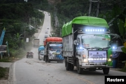 Truk membawa kotak suara saat pendistribusian di kawasan Ibu Kota Negara Nusantara (IKN) di Sepaku, Kalimantan Timur, 11 Februari 2024. (Foto: Antara/Rivan Awal Lingga via REUTERS)