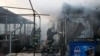 Vatrogasci rade na gašenju požara nakon ruskih raketnih udara, u Čerkasima, Ukrajina 21. septembra 2023.