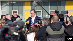 FILE - Serbian President Aleksandar Vucic speaks to reporters in Belgrade, April 3, 2022. Serbia has a vibrant media landscape, but reporters often face political pressure, according to press freedom groups.