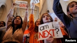 Protesters gather inside the Tennessee State Capitol to call for an end to gun violence and support stronger gun laws after a deadly shooting at the Covenant School in Nashville, Tennessee, March 30, 2023.