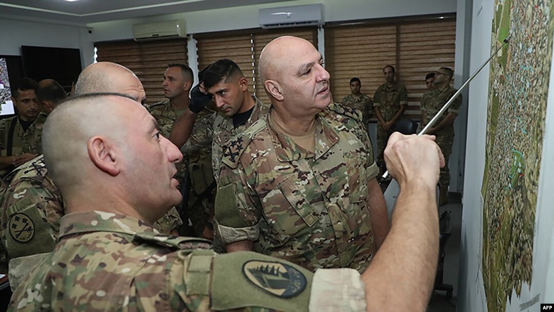 FILE - This handout picture released Sept. 14, 2023 shows Lebanese Army Chief Joseph Aoun meeting with soldiers at the Mohammad Zgheib Barracks in Sidon. (AFP photo / handout / Twitter account of the Lebanese Army)
