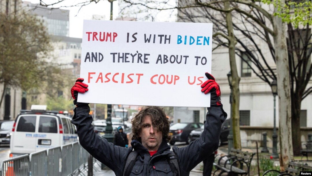 Max Azzarello of St. Augustine, Florida, who police identified as the man who set himself on fire on Friday outside the New York courthouse where Donald Trump's trial was taking place, stands a day earlier outside the same courthouse, April 18, 2024.