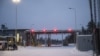 Red lights are seen at the Raja-Jooseppi international border crossing station in Inari, northern Finland, on Nov. 29, 2023. (Lehtikuva/Otto Ponto via Reuters)