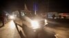 A Red Cross vehicle carrying hostages abducted by Hamas militants during the October 7 attack on Israel arrives at Rafah border, amid a hostages-prisoners swap deal between Hamas and Israel, in southern Gaza Strip, Nov. 28, 2023. 