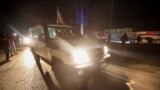 A Red Cross vehicle carrying hostages abducted by Hamas militants during the October 7 attack on Israel arrives at Rafah border, amid a hostages-prisoners swap deal between Hamas and Israel, in southern Gaza Strip, Nov. 28, 2023. 