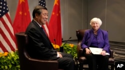 FILE —U.S. Treasury Secretary Janet Yellen, right, meets with Chinese Vice Premier He Lifeng in San Francisco, Nov. 10, 2023. The Economic Working Group the two established to maintain a healthy economic relationship between the two nations met this week in Beijing.