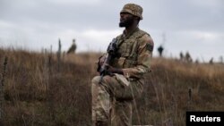 A British soldier patrols the Kosovo-Serbia border in Jarinje, Kosovo, Nov. 24, 2023.