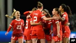 Swiss team players celebrate after the Women's World Cup Group A soccer match between New Zealand and Switzerland, in Dunedin, New Zealand, July 30, 2023.