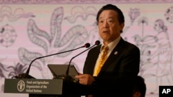 FILE - Qu Dongyu, U.N. Food and Agriculture Organization director-general, speaks during an FAO conference in Colombo, Sri Lanka, Feb. 20, 2024. Qu on July 17, 2024, praised recent North Korean progress in improving food security.