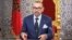 This handout picture provided by the Moroccan agency press (MAP) on July 30, 2023, shows Morocco's King Mohammed VI delivering a speech to the nation, marking the 24th anniversary of his accession to the throne, 