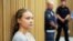 Aktivis iklim Greta Thunberg dari Swedia menunggu sidang di pengadilan di Malmo, Swedia, Senin, 24 Juli 2023. ( AP/Pavel Golovkin)