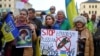 La gente participa en una manifestación contra el conflicto Rusia-Ucrania, mientras se celebra la Conferencia de Seguridad de Munich (MSC), en Munich, Alemania, el 17 de febrero de 2024. [Foto: Archivo/Reuters]. 