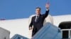U.S. Secretary of State Antony Blinken waves as he boards his plane at an airport in Tel Aviv, Israel, Feb. 8, 2024.