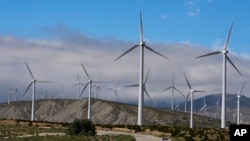 FILE - Wind turbines operate on March 7, 2024, in Palm Springs, Calif. According to a new report published April 16, 2024, last year, marked the best year for new wind projects. 