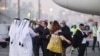 Siamak Namazi and Morad Tahbaz, who were released during a prisoner swap deal between U.S. and Iran, arrive at Doha International Airport, Qatar, Sept. 18, 2023. 