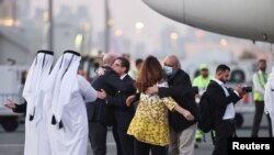 Siamak Namazi and Morad Tahbaz, who were released during a prisoner swap deal between U.S. and Iran, arrive at Doha International Airport, Qatar, Sept. 18, 2023. 