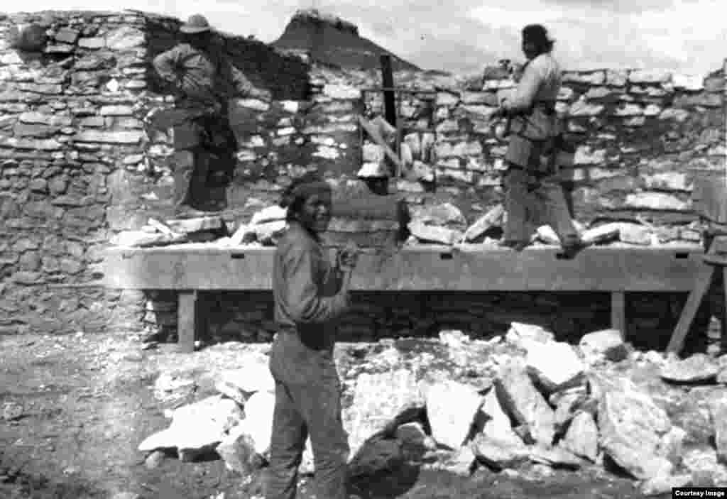 &quot;Stone Masons, Chonto, Grant, and Cas&quot; working on building Western Navajo (Blue Canyon) boarding school, Algert, Az., ca. 1901. Museum of Northern Arizona Walter Runke Collection (MS-74-1-9).