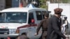 یک امبولانس در حال انتقال قربانیان حمله انتحاری در نزدیکی وزارت خارجه - روز دوشنبه ۲۷ مارچ ۲۰۲۳