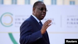 FILE - Senegal's President Macky Sall arrives for the closing session of the New Global Financial Pact Summit, June 23, 2023 in Paris, France. 