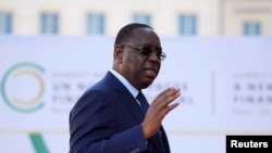 FILE - Senegal's President Macky Sall arrives for the closing session of the New Global Financial Pact Summit, June 23, 2023 in Paris.