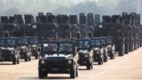 FILE - Military vehicles are seen during a parade in Naypyitaw, Myanmar, March 27, 2023.