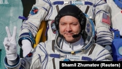 Anggota awak Stasiun Luar Angkasa Internasional (ISS) Oleg Kononenko dari Rusia menaiki pesawat ruang angkasa Soyuz MS-11 di Kosmodrom Baikonur, Kazakhstan, 3 Desember 2018. (Foto: REUTERS/Shamil Zhumatov)