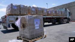 FILE - A bundle of humanitarian aid for the Gaza Strip with the logo of World Central Kitchen is on a truck at the Kerem Shalom border crossing in southern Israel on May 30, 2024.