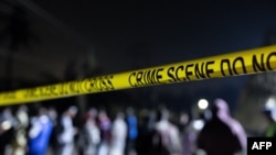 FILE - Police crime scene tape is seen at the site of an explosion in the Bodija area of Ibadan, Nigeria, Jan. 16, 2024.