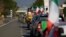 Farmers line up with their tractors on the high speed road in Orte, Italy, Jan. 31, 2024. 