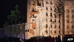 This photograph shows a residential building damaged by a Russian missile strike in Dnipro, July 28, 2023.
